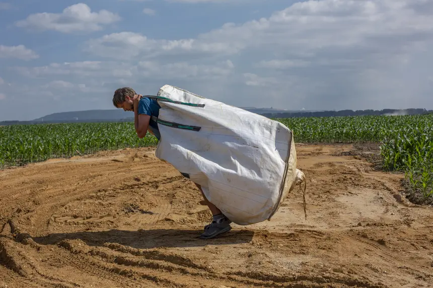 Michal Iwanowski, pulling a sack, Go Home Polish, Adventure Uncovered